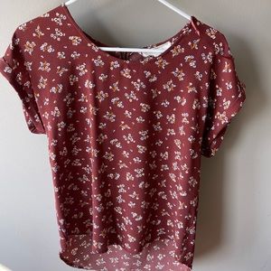 Hippo Rose brand blouse. Longer in back then front.